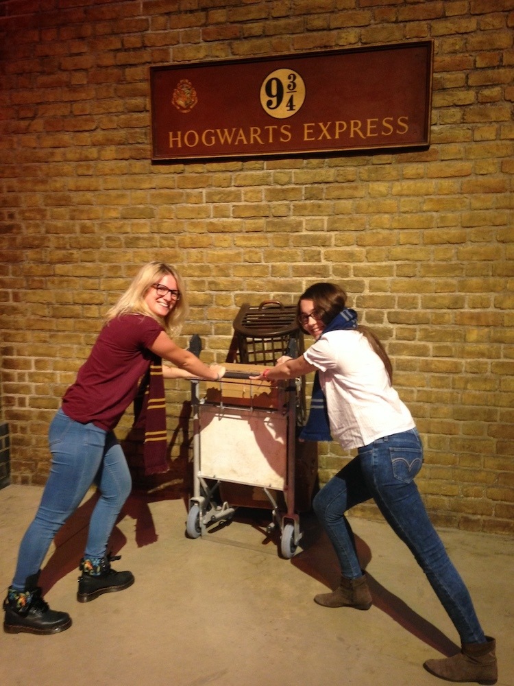 Visiting platform 9 and 3/4 with my friend Laura