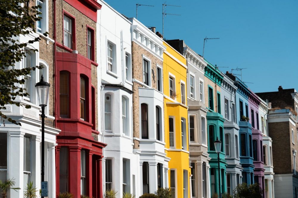 The bold colourful houses of Lancaster Road, photo by Travels of Sophie / We Dream Of Travel